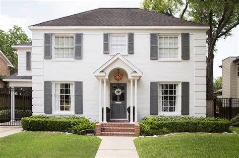 white house dark grey shutters